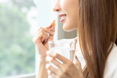 woman taking supplements